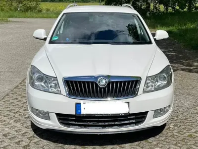 Używany Skoda Octavia Ambiente 122 KM (89 kW) 2011 Biały Kombi