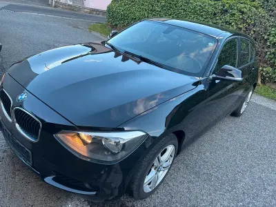 Gebraucht BMW 116 116 PS (85 kW) 2011 Schwarz Kleinwagen