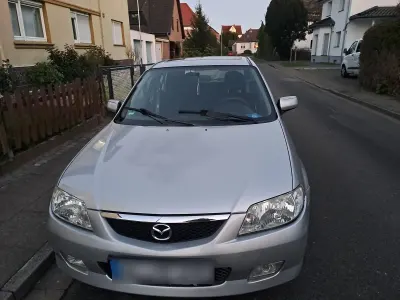 Second-hand Mazda 323F Inclusive 95 CP (69 kW) 2001 Argintiu Break