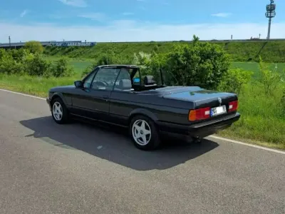 Gebraucht BMW 318 Cabriolet 113 PS (83 kW) 1992 Schwarz Cabrio