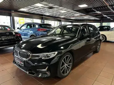 Second-hand BMW 330 Luxury Line 286 CP (210 kW) 2022 Negru Break
