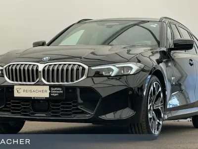 Gebraucht BMW 330e M Sport 292 PS (214 kW) 2025 Saphirschwarz metallic Kombi