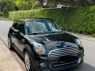 Gebraucht Mini Cooper 122 PS (89 kW) 2010 Schwarz Kleinwagen