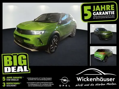 Gebraucht Opel Mokka Elegance 131 PS (96 kW) 2023 Matcha green/ikone gruen (metallic) SUV