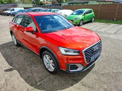 Używany Audi Q2 Sport 116 KM (85 kW) 2018 Pomarańczowy SUV