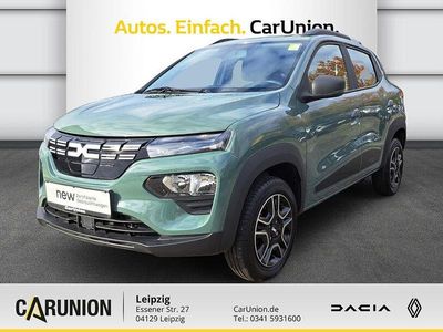 Olivgrau Gebraucht 2023 Dacia Spring Essentiel Kleinwagen | 13.990 € (Fairer Preis)