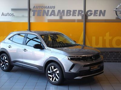 Gebraucht Opel Mokka-e Elegance 100 kW (136 PS) 2023 Kontrast grau/quarz silber SUV