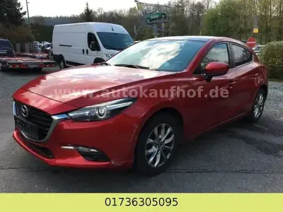 Używany Mazda 3 Signature 120 KM (88 kW) 2019 Czerwony Sedan/Limuzyna