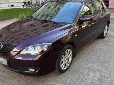 Używany Mazda 3 105 KM (77 kW) 2008 Purpurowy Sedan/Limuzyna