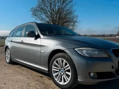 Gebraucht BMW 320 105 PS (77 kW) 2010 Grau Kombi