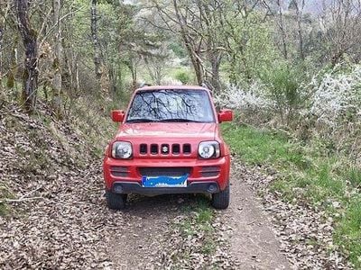Second-hand Suzuki Jimny Club 86 CP (63 kW) 2006 Roșu SUV