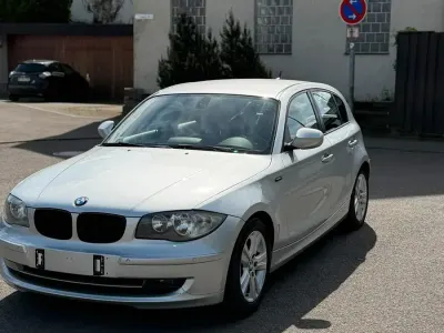 Gebraucht BMW 116 122 PS (89 kW) 2011 Grau Kleinwagen