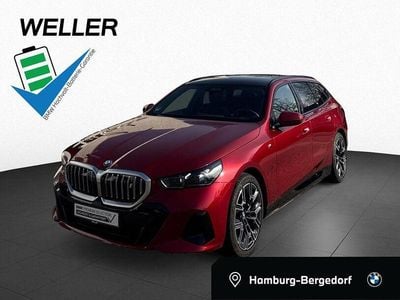 Gebraucht BMW i5 M Sport 250 kW (340 PS) 2025 Fire red metallic (rot) Kombi