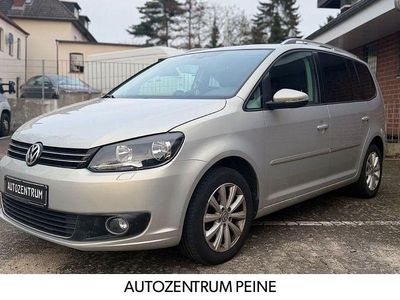 Second-hand VW Touran Highline 177 CP (130 kW) 2013 Argintiu Monovolum