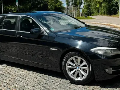 Gebraucht BMW 520 184 PS (135 kW) 2011 Schwarz Kombi
