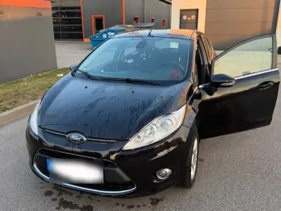 Gebraucht Ford Fiesta 60 PS (44 kW) 2012 Schwarz Kleinwagen