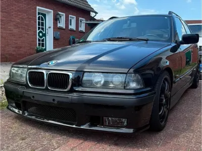 Gebraucht BMW 320 M Sport 150 PS (110 kW) 1995 Schwarz Kombi