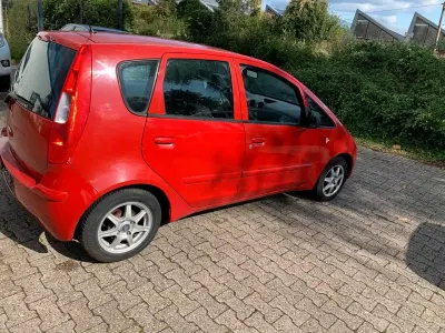 Gebraucht Mitsubishi Colt 85 PS (62 kW) 2006 Rot SUV