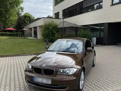 Gebraucht BMW 116 122 PS (89 kW) 2010 Braun Kleinwagen