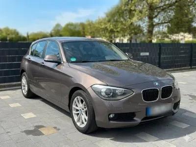 Gebraucht BMW 114 102 PS (75 kW) 2014 Braun Kleinwagen