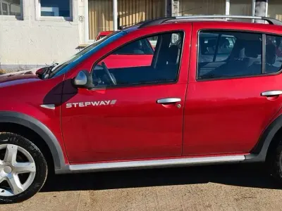 Używany Dacia Sandero Stepway 84 KM (61 kW) 2011 Czerwony Sedan/Limuzyna