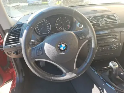 Używany BMW 116 Urban Line 116 KM (85 kW) 2011 Czerwony Hatchback