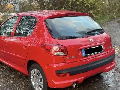 Gebraucht Peugeot 206+ 60 PS (44 kW) 2013 Kleinwagen