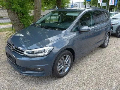 Gebraucht VW Touran Comfortline 150 PS (110 kW) 2024 Grau Van / Kleinbus