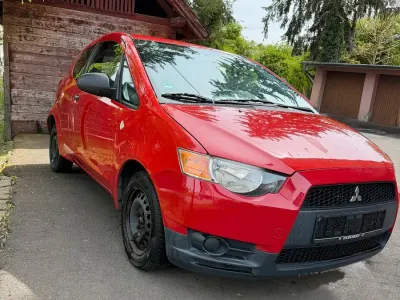 Second-hand Mitsubishi Colt 75 CP (55 kW) 2009 Roșu Hatchback