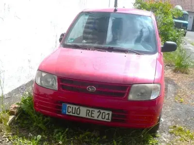 Gebraucht Daihatsu Cuore Plus 56 PS (41 kW) 1998 Rot Kleinwagen