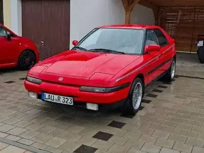 Gebraucht Mazda 323F 88 PS (64 kW) 1991 Rot Limousine