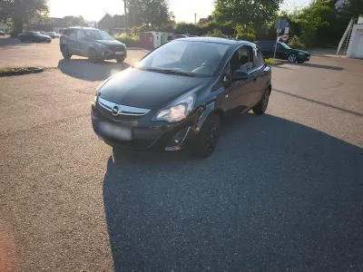 Gebraucht Opel Corsa 101 PS (74 kW) 2014 Schwarz Kleinwagen