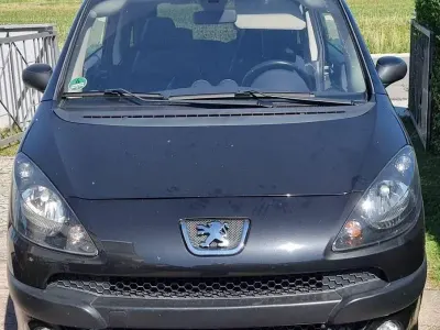 Gebraucht Peugeot 1007 107 PS (78 kW) 2005 Schwarz Van / Kleinbus