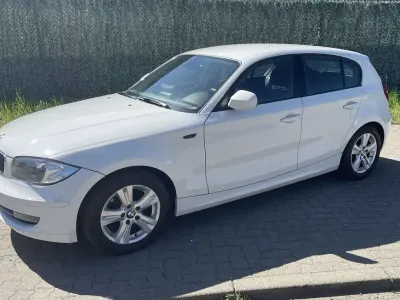 Używany BMW 116 Lifestyle 122 KM (89 kW) 2011 Biały Hatchback