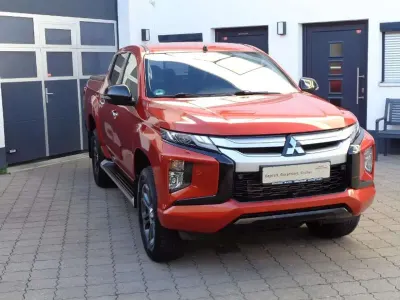 Gebraucht Mitsubishi L200 Top 150 PS (110 kW) 2021 Zirkonorange Pickup