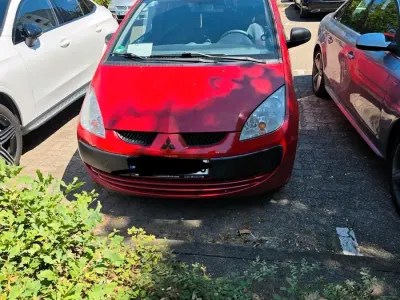 Gebraucht Mitsubishi Colt 75 PS (55 kW) 2007 Rot Kleinwagen
