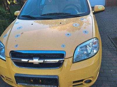 Second-hand Chevrolet Aveo 84 CP (61 kW) 2006 Galben Berlinǎ