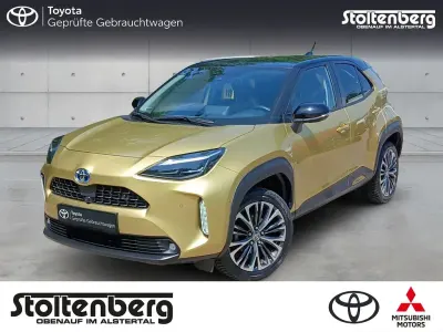 Gebraucht Toyota Yaris Elegant 116 PS (85 kW) 2022 Brass gold metallic (5c2)/ bla Kleinwagen