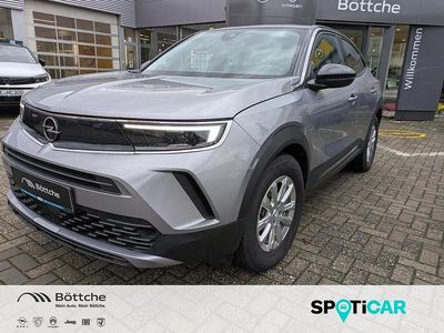 Gebraucht Opel Mokka-e Edition 100 kW (136 PS) 2022 Kontrast grau/quarz silber SUV