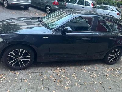 Gebraucht BMW 116 122 PS (89 kW) 2009 Schwarz Kleinwagen