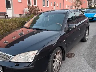 Używany Ford Mondeo Ghia 170 KM (125 kW) 2006 Czarny Sedan/Limuzyna