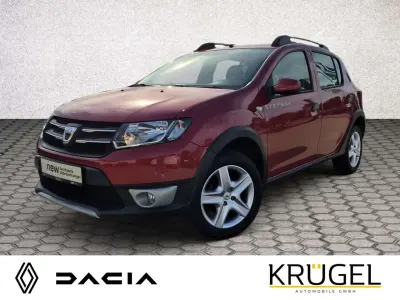 Gebraucht Dacia Sandero Prestige 90 PS (66 kW) 2016 Flammenrot metallic Kleinwagen