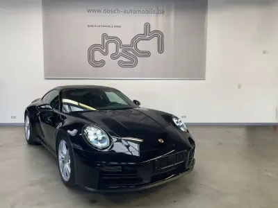Gebraucht Porsche 911 Carrera 394 PS (289 kW) 2025 Tiefschwarz Coupé
