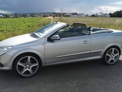 Second-hand Opel Astra Cabriolet Cosmo 140 CP (102 kW) 2006 Argintiu Cabrio