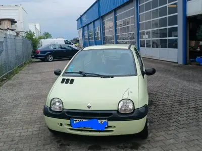 Używany Renault Twingo 58 KM (42 kW) 2006 Żółty Hatchback