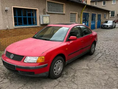 Używany VW Passat 100 KM (73 kW) 1998 Czerwony Sedan/Limuzyna