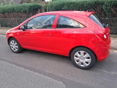 Gebraucht Opel Corsa 60 PS (44 kW) 2009 Rot Kleinwagen