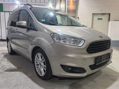 Gebraucht Ford Tourneo Courier Titanium 101 PS (74 kW) 2016 Titangrau metallic Van / Kleinbus