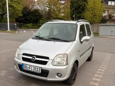 Używany Opel Agila 60 KM (44 kW) 2006 Srebrny Hatchback
