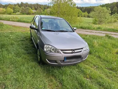 Używany Opel Corsa 80 KM (58 kW) 2006 Purpurowy Hatchback
